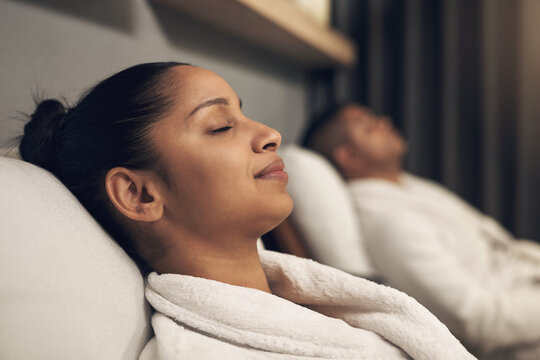 Spa, sleep and woman in center with robe, healing treatment and relaxation at wellness resort. Calm, rest and female person at lodge with gown, stress relief and tranquil pamper in luxury care.