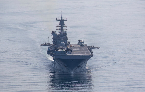 STRAIT OF HORMUZ U.S. Navy and Coast Guard ships participates in a photo exercise while transiting the Strait of Hormuz,  Sioux City is deployed to the U.S. 5th Fleet area of operations to help ensure