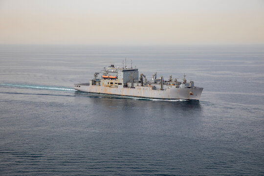 STRAIT OF HORMUZ U.S. Navy and Coast Guard ships participates in a photo exercise while transiting the Strait of Hormuz,  Sioux City is deployed to the U.S. 5th Fleet area of operations to help ensure