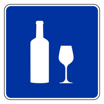 Schild mit Weinflasche und Glas