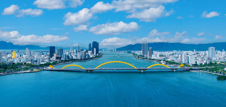 Aerial view Dragon bridge over han river in da nang scenic skyline and blue skies
