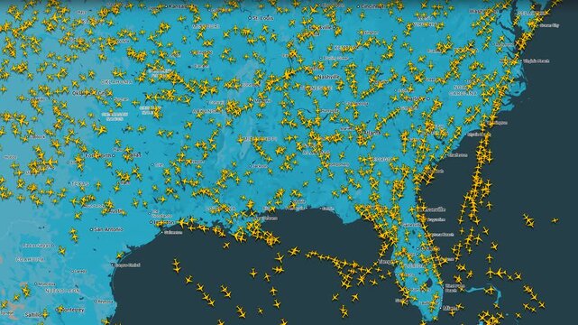 Air traffic map over United States showing dense aircraft activity, realtime aviation monitoring with numerous airplanes across national airspace