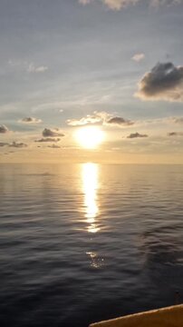 sunset over the ocean in time lapse mode
