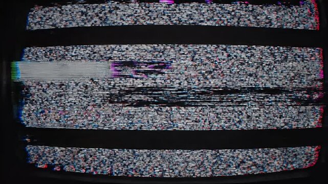 A close-up view of a vintage television screen displaying static, showcasing a grainy texture and a dark horizontal scan line.