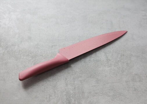 Ceramic knife on a concrete kitchen countertop