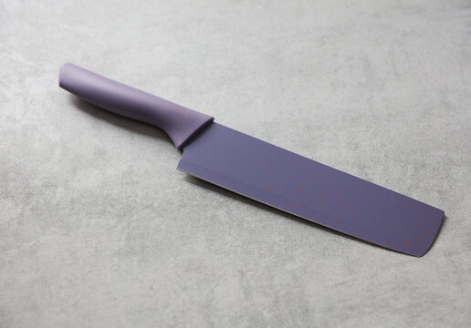 Ceramic knife on a concrete kitchen countertop
