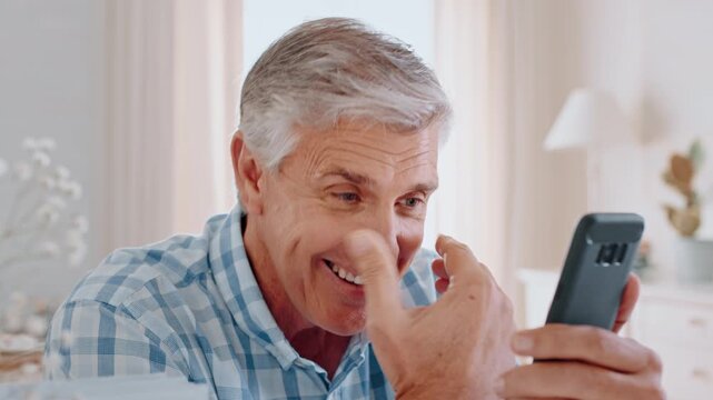 Senior, happy man and laughing with phone in home for funny joke, social media or online app. Elderly, male person or comedy with smile on mobile smartphone for text, humor or web browsing in house