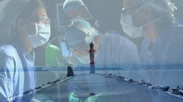 Surgical team incising, treating, assistant bagging Ambu bag, ghosted pier overlay showing statue