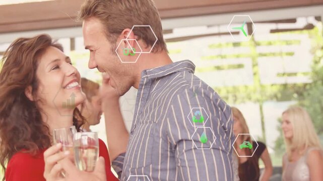 Couple clinking glasses, celebrating and feeding while green hex icons highlighting hands at event