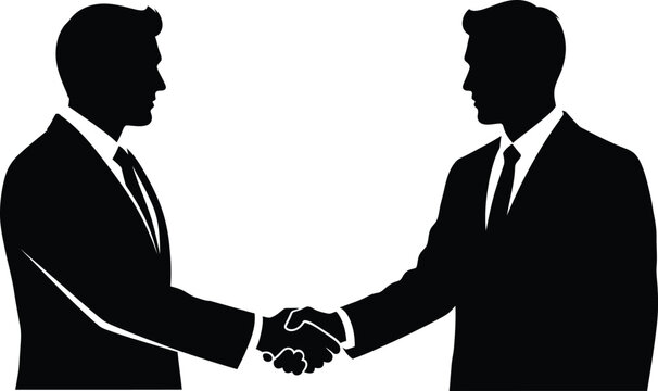 Business partnership silhouette of two men shaking hands