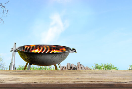 summer time in backyard garden with grill BBQ, wooden table, blurred background