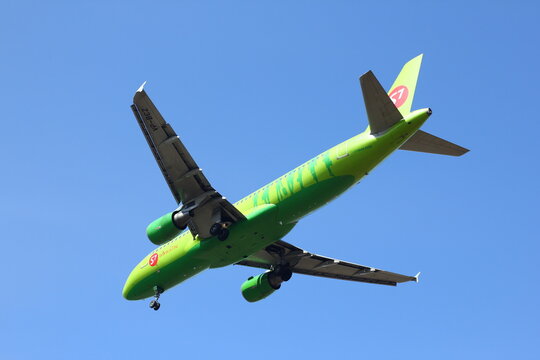 OB, TOLMACHEVO, NOVOSIBIRSK - 30 APRIL 2016: Airbus A-320 S7 airlines landing in blue sky at Novosibirsk Tolmachevo airport.