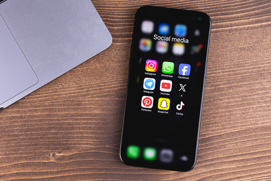 mobile smartphone iPhone with social media icon apps on a screen Facebook, Instagram, WhatsApp, Telegram, YouTube, TikTok, Snapchat, X, Pinterest. Batumi, Georgia - March 19, 2026