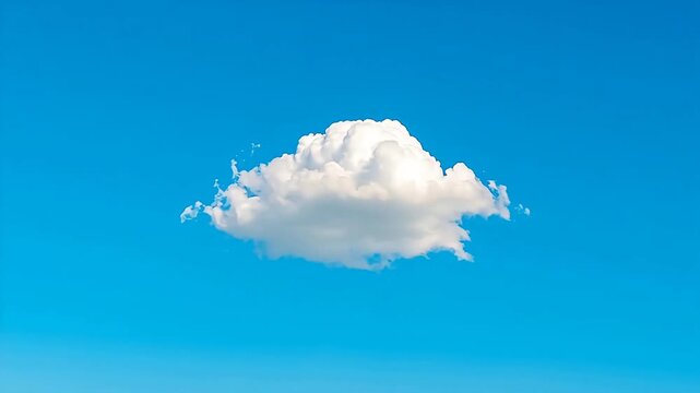 Single fluffy cloud in blue sky