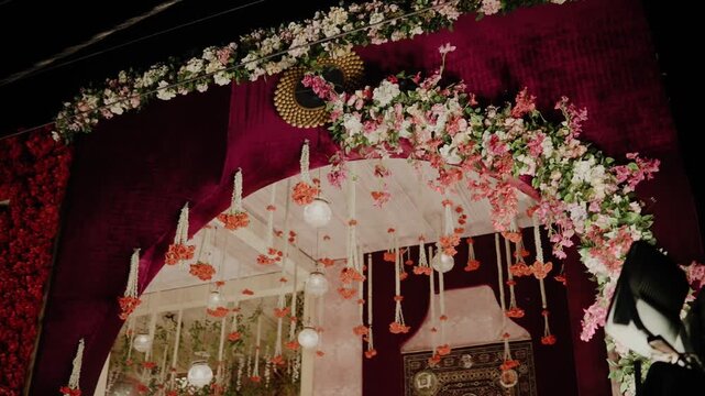 Elegant Wedding Venue Decor with Floral Arrangements and Ambient Lighting