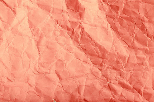 Full frame close-up of crumpled beige paper texture