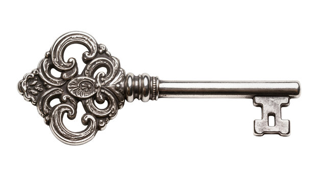 Isolated beautiful ornate antique silver key, vintage decorative metal object representing access and history