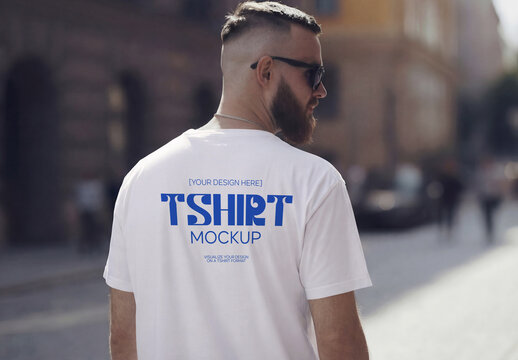 Mockup Of Man Wearing Customizable T-Shirt, Rear View