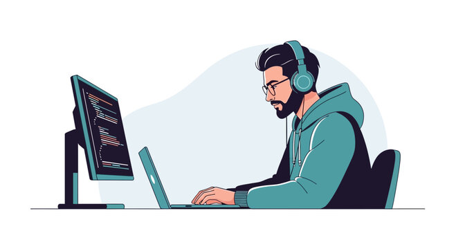 Programmer with headphones working on laptop and desktop computer, coding