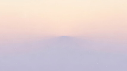 Fototapeta premium A serene gradient background transitioning from light yellow at the top to soft blue at the bottom.