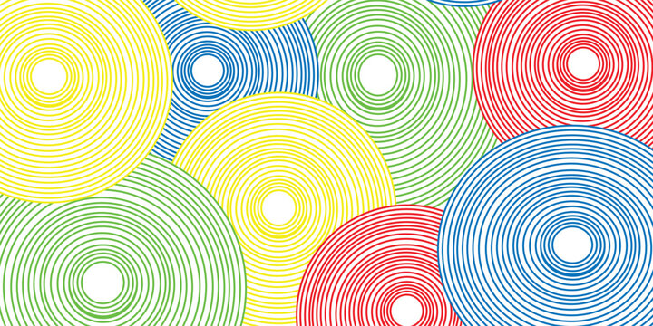 A vibrant pattern of overlapping concentric circles in red blue green and yellow fills an Adobe Illustrator canvas creating a bold geometric design.