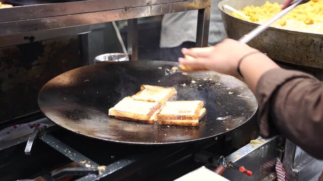 Bread Toast Preparation on Old Delhi's Streets, 4K Footage