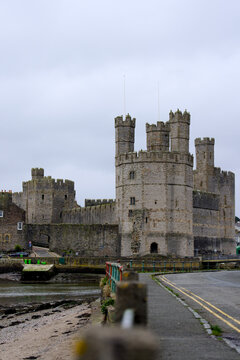 Caernarfon castle walls overlooking aber foreshore road