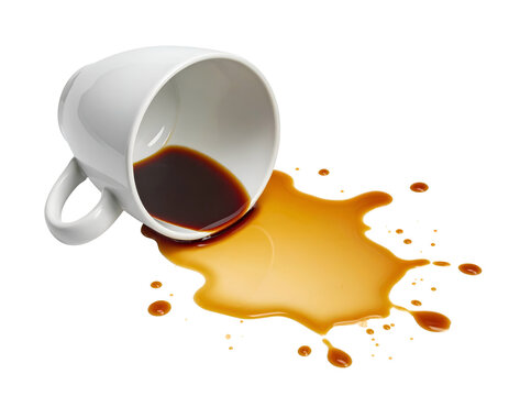 White mug tipped over, spilling dark liquid onto white surface