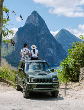 Explore stunning landscapes from a car in Saint Lucia's lush mountains and tranquil waters