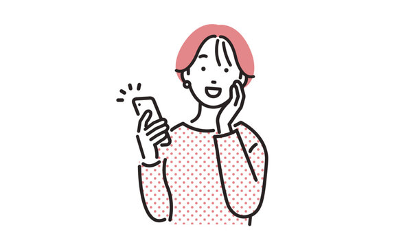 スマホを見て喜ぶ女性