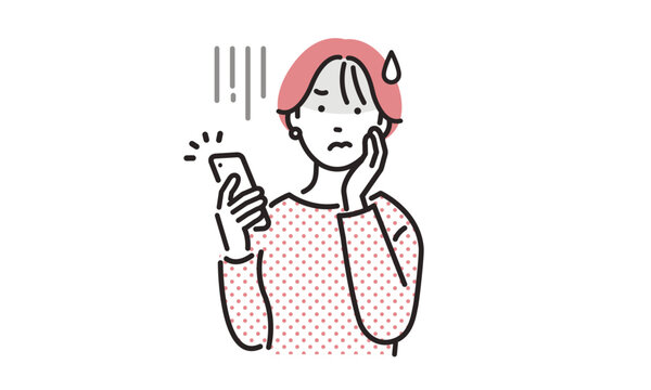 スマホを見て不安になる女性