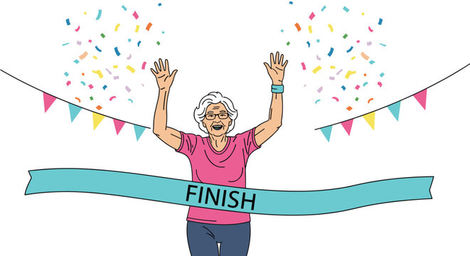 Energetic senior woman with gray hair smiling and crossing the finish line of a marathon with confetti and flags around her.