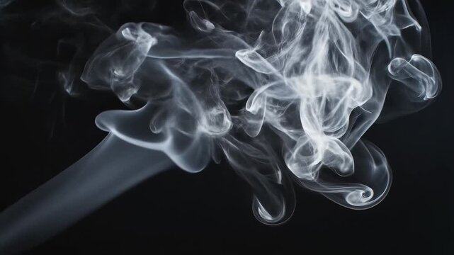 White smoke curling on black background for commercial backgrounds, digital design, and advertising
