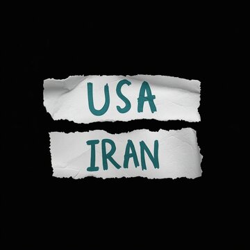 A torn paper with USA and IRAN written on it against a black background