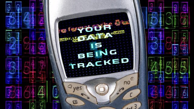 retro and old mobile telephone with your data is being tracked