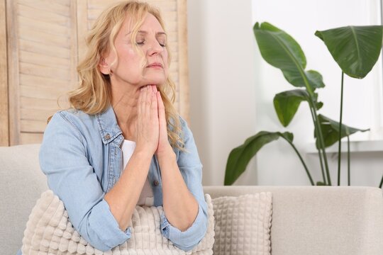 Woman suffering from hormonal disorders at home