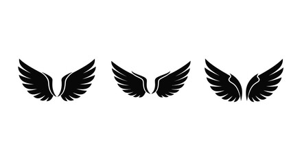 Obraz premium Three black wing designs arranged on a white background silhouette