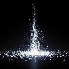 Obraz premium Sparkling particles exploding in dark background