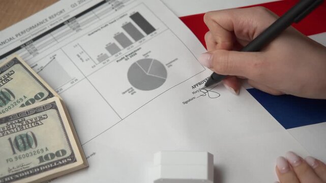 Dutch CFO signs internal financial report featuring profit charts first then brands purple approved seal ratifying international company strategies.