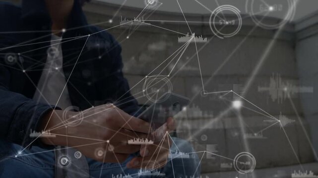 Man tapping phone on steps making live network graphs showing tech data while camera pulling back