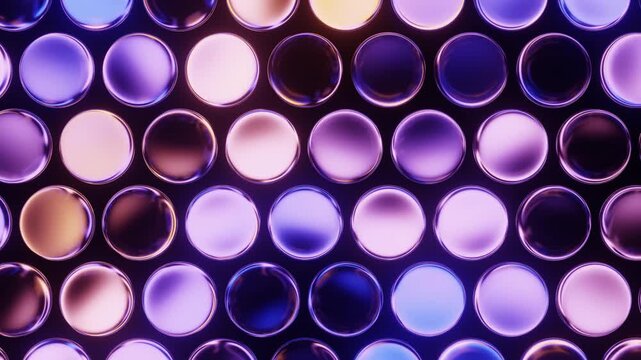 Multicolored round glassy lights on a grid panel glowing with vibrant, rhythmic pattern on a dark surface. Seamless loop.