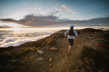 Trail Running on Epic Mountain Peak  © febmotion