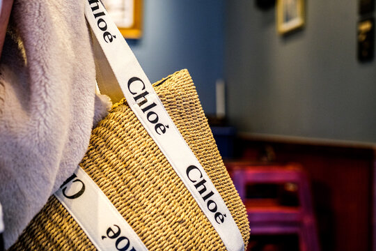 Cropped Image of Unseen Anonymous Woman With A Fashionable Chloe Designer Shoulder Bag