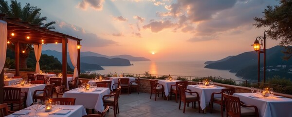 Fototapeta premium Restaurant terrace with tables set for dining overlooks calm sea at sunset. Evening lights glow on pergolas and lamps. Mountain islands are silhouetted against warm sky.