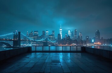 Obraz premium Empty rooftop terrace overlooks illuminated New York City skyline at night. Brooklyn Bridge glows with bright blue lights over river. Modern skyscrapers stretch across the dark horizon.