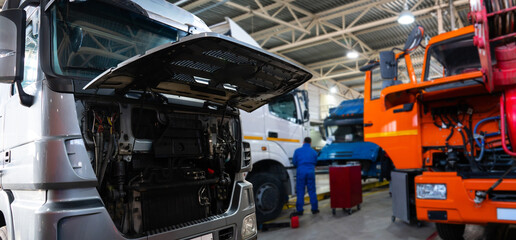 Obraz na płótnie Canvas Commercial trucks repair service workshop