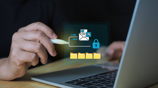 Digital security protecting sensitive email and data, with user managing secure information flow on laptop