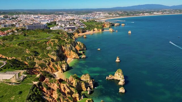 Aerial View on Coastline of Lagos Algarve Portugal, flying forwards
