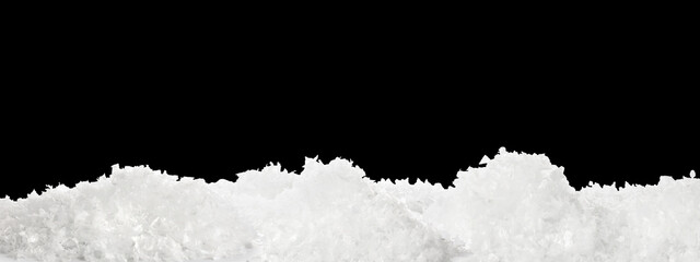Obraz premium White snow against black background. Banner design