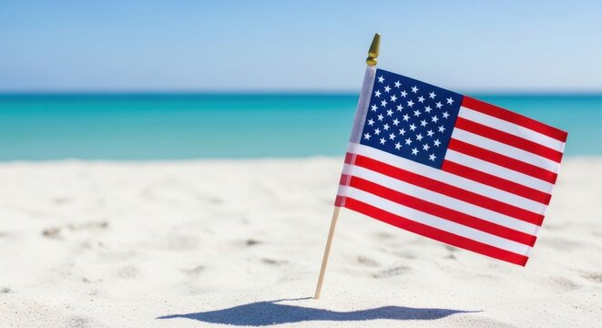 American flag on tropical beach sand, United States national flag with ocean background, patriotic summer vacation and holiday concept